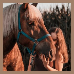 woman with a horse in private therapy